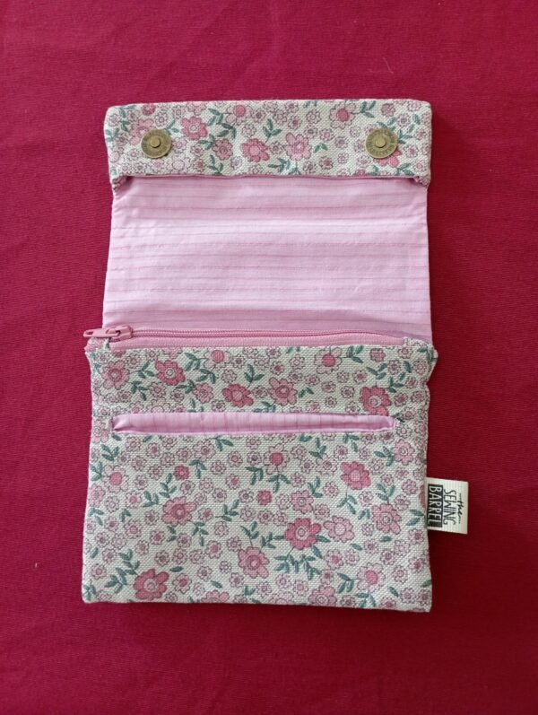 Tabakdose mit rosa Blumen